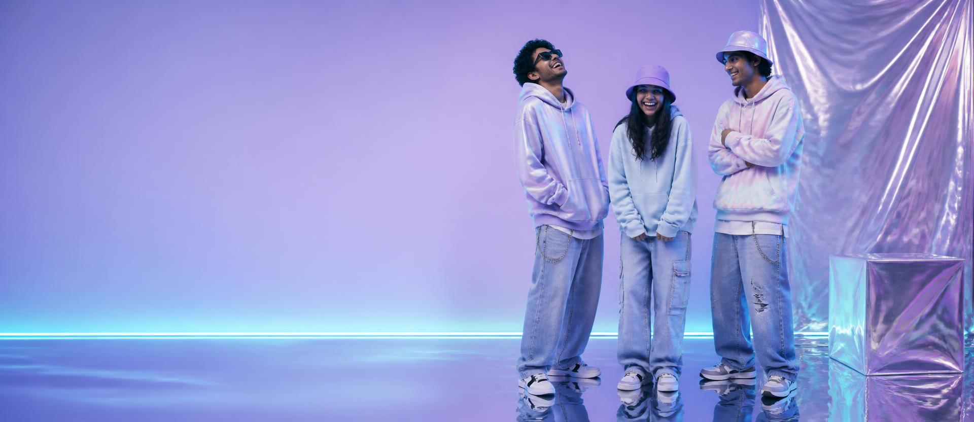 Friends wearing POAM oversized hoodies and baggy jeans